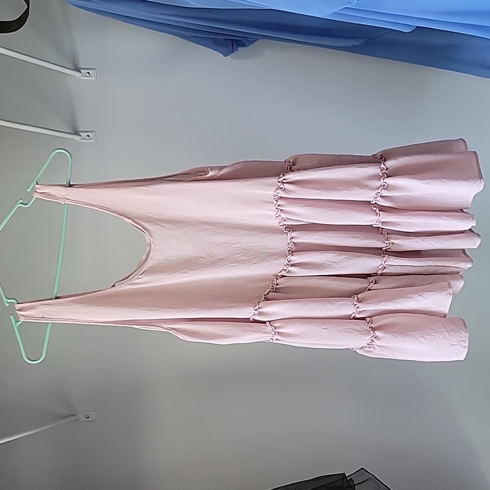 Light pink ruffled swimsuit cover up